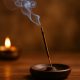 What is the significance of burning incense sticks?